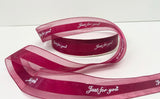 Red ‘Just for you’ ribbon