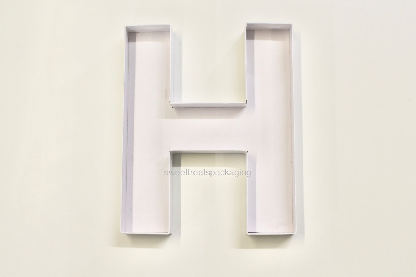 Empty letter ‘H’